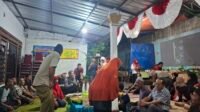 Keterangan : Warga RT 21 RW 07 Taman Kota Madiun gelar acara tasyakuran peringati Hari Kemerdekaan RI ke 80 di balai warga (Foto : Zack,NewsTujuh)