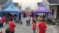 Antusiasme warga perumahan Pilangrejo Permai Madiun ikuti gelaran jalan sehat dan senam bersama (Foto : NewsTujuh)